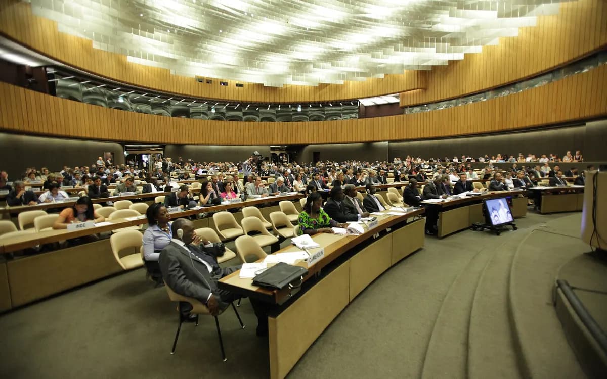 A full session of the UN Human Rights Council in Geneva, delegations seated in curved rows of desks